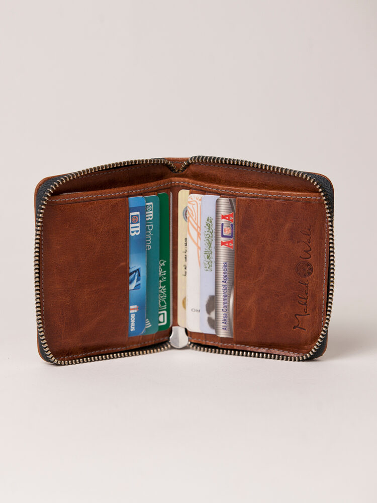 The Most leather wallet for men and women has one main compartment for banknotes and 8 cards slots.
